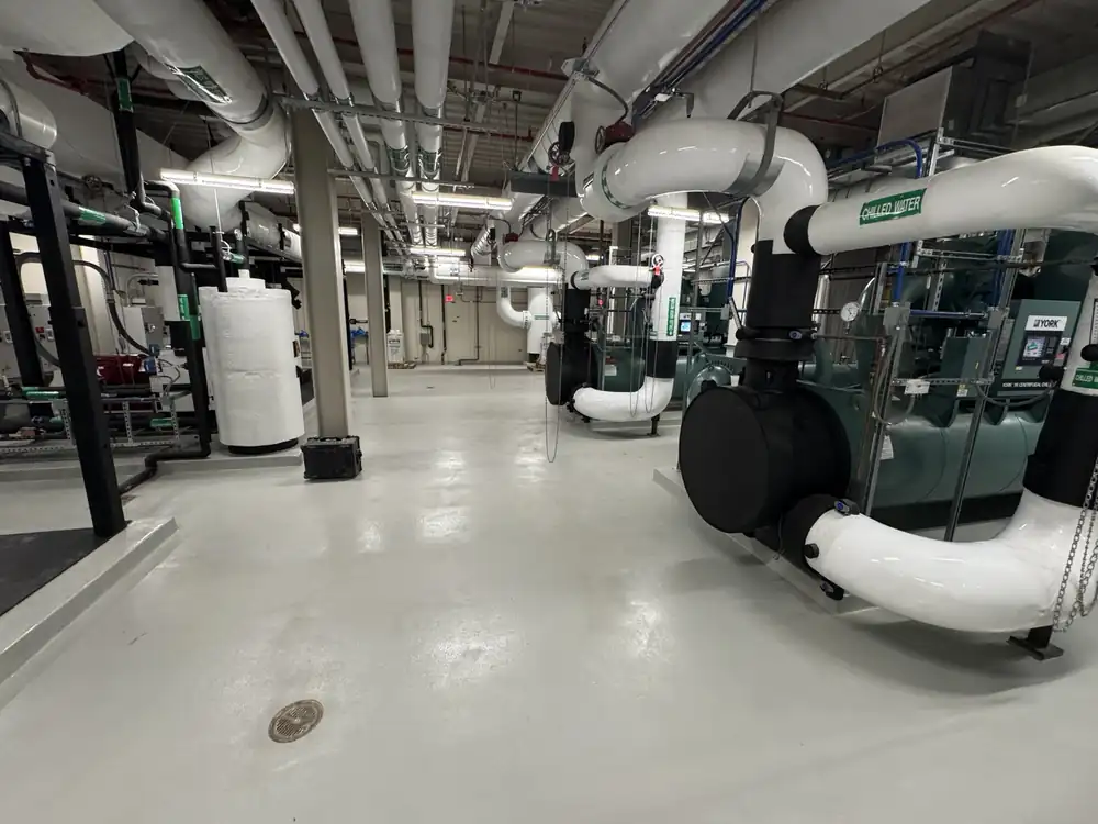 Completed 15,000 SF hospital facilities urethane cement flooring in a mechanical room