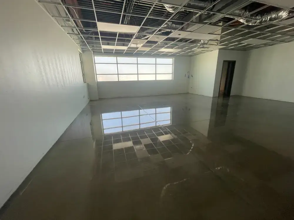 Polished concrete floor with reflective finish